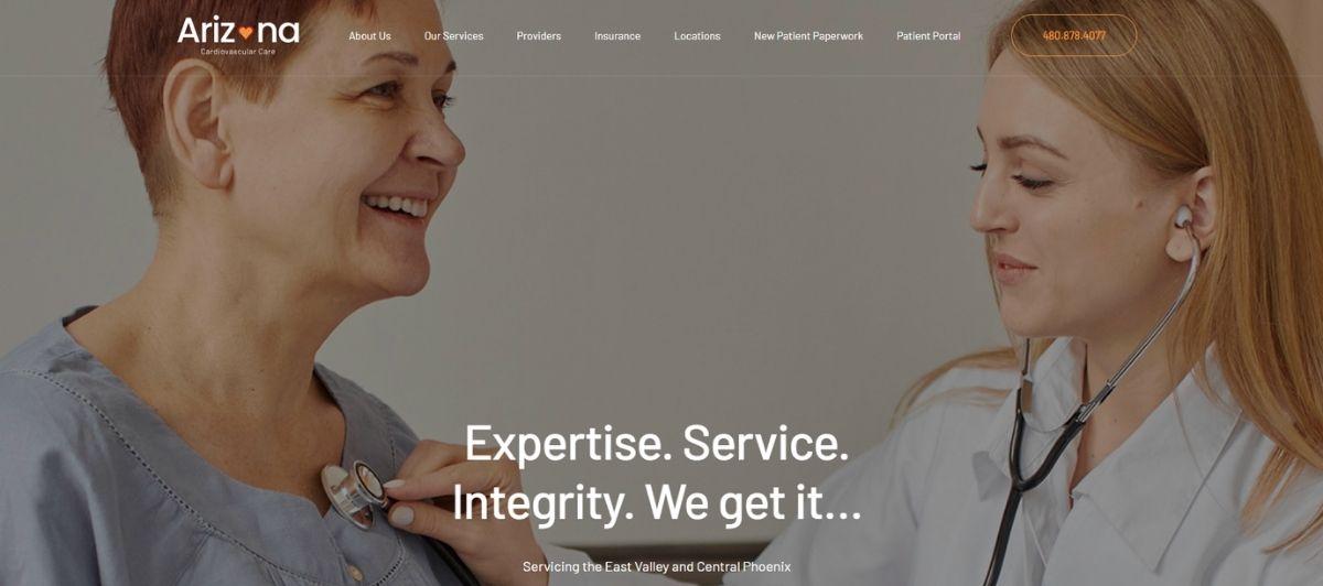 Two healthcare workers in a clinic; a nurse with a stethoscope checks a smiling patient as they interact in a care setting. Overlay text: 'Expertise. Service. Integrity. We get it...'