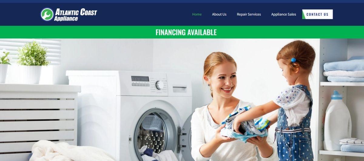 Woman and young girl folding laundry in a bright laundry room beside a front-loading washing machine.