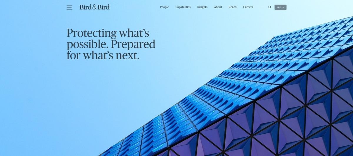 Hero banner with blue sky and a glass-paneled building, featuring the Bird & Bird logo and the slogan: “Protecting what’s possible. Prepared for what’s next.”