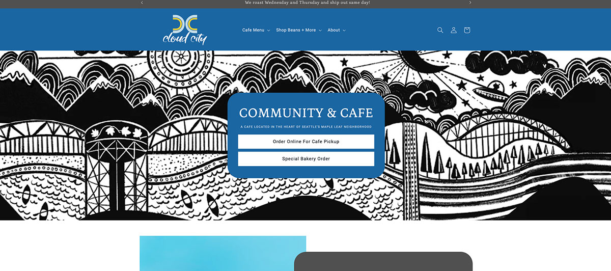 Blue hero banner with a black-and-white illustrated landscape and a central blue callout reading 'COMMUNITY & CAFE' with two input boxes for 'Order Online For Cafe Pickup' and 'Special Bakery Order' accessibly highlighted in white text.