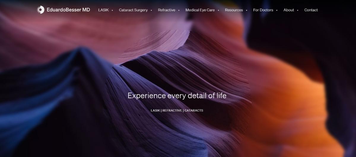 Hero image for Eduardo Besser MD: abstract canyon background with the tagline 'Experience every detail of life' and navigation bar at the top