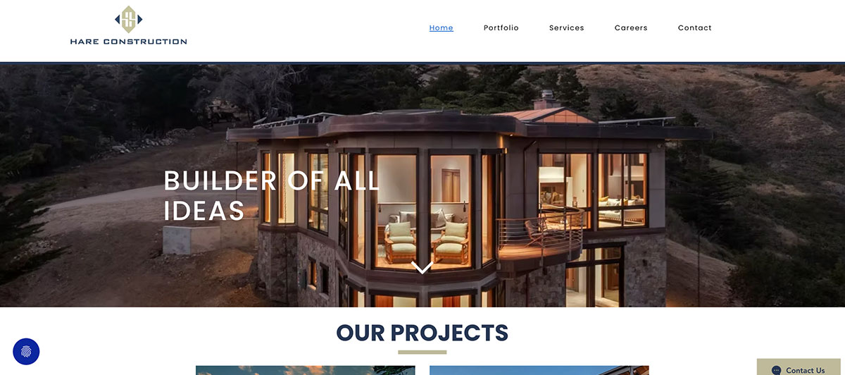 Modern hillside house with glass walls lit at dusk, used as the Hare Construction hero image with the slogan 'Builder of all ideas' overlaid.