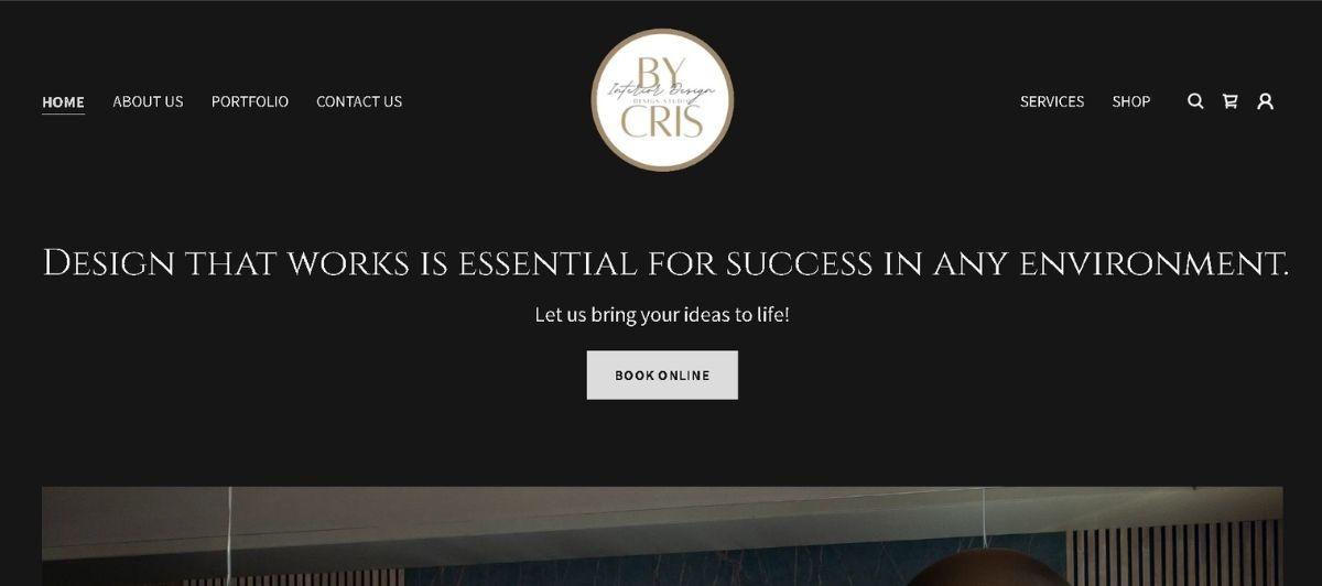Design studio homepage hero with dark background, circular logo at top, and bold tagline: 'Design that works is essential for success in any environment.' with a 'Book Online' CTA button.