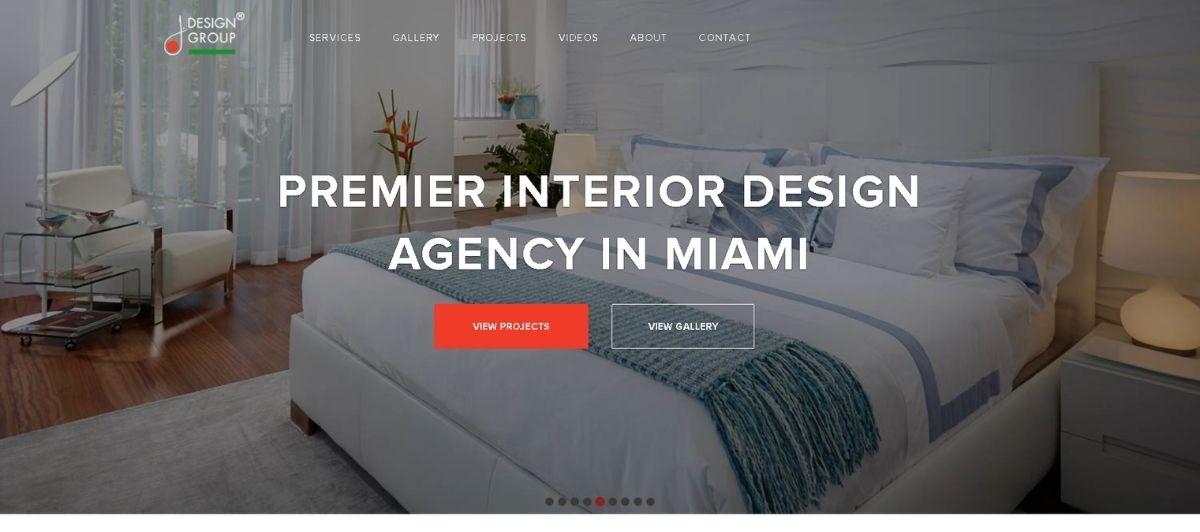 Hero banner of a modern Miami bedroom for Premier Interior Design, with white bedding and blue accents, plus CTAs 'View Projects' and 'View Gallery'.