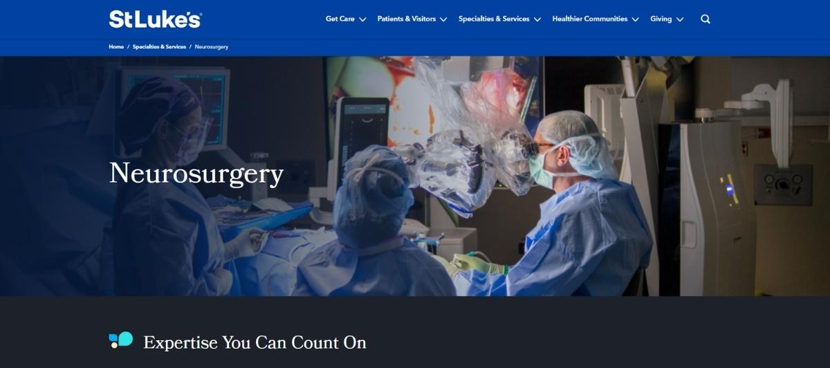 Neurosurgery team performing an operation in a sterile operating room with advanced surgical equipment