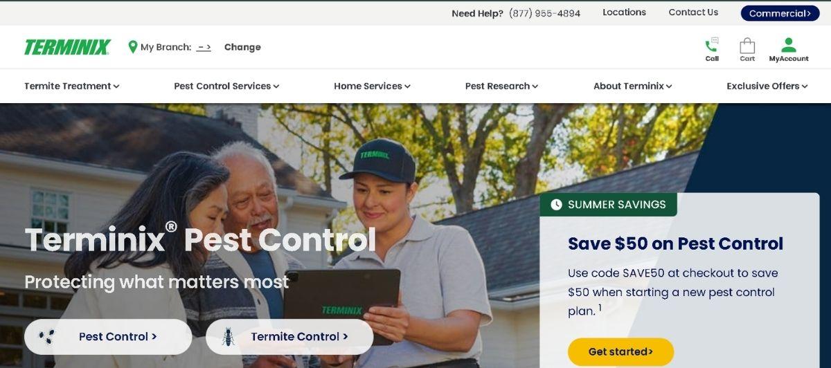 Termix Pest Control hero image: three technicians review a tablet outside a home for pest service.