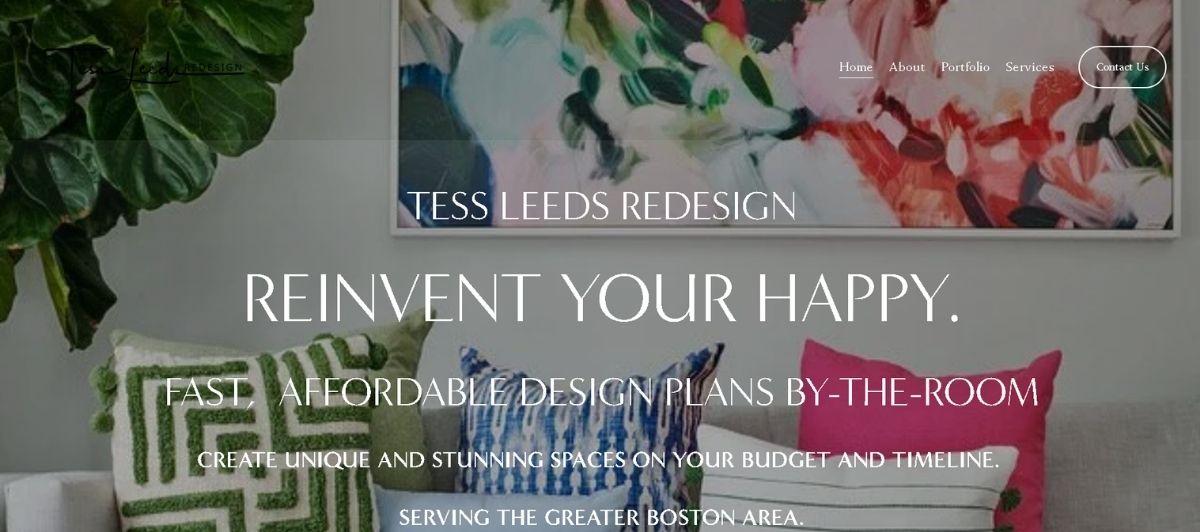 Hero image for Tess Leeds Design: living room with a colorful abstract painting, green plant, and decorative cushions.