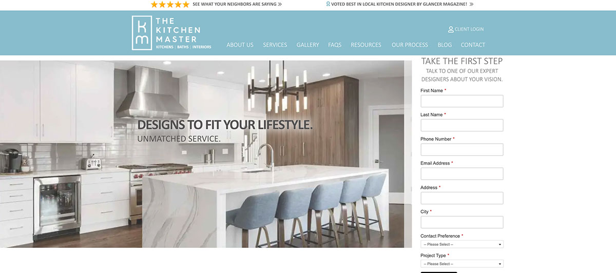 Modern white kitchen with marble island and blue stools, featuring the banner text 'DESIGNS TO FIT YOUR LIFESTYLE' on a showroom-style backdrop.