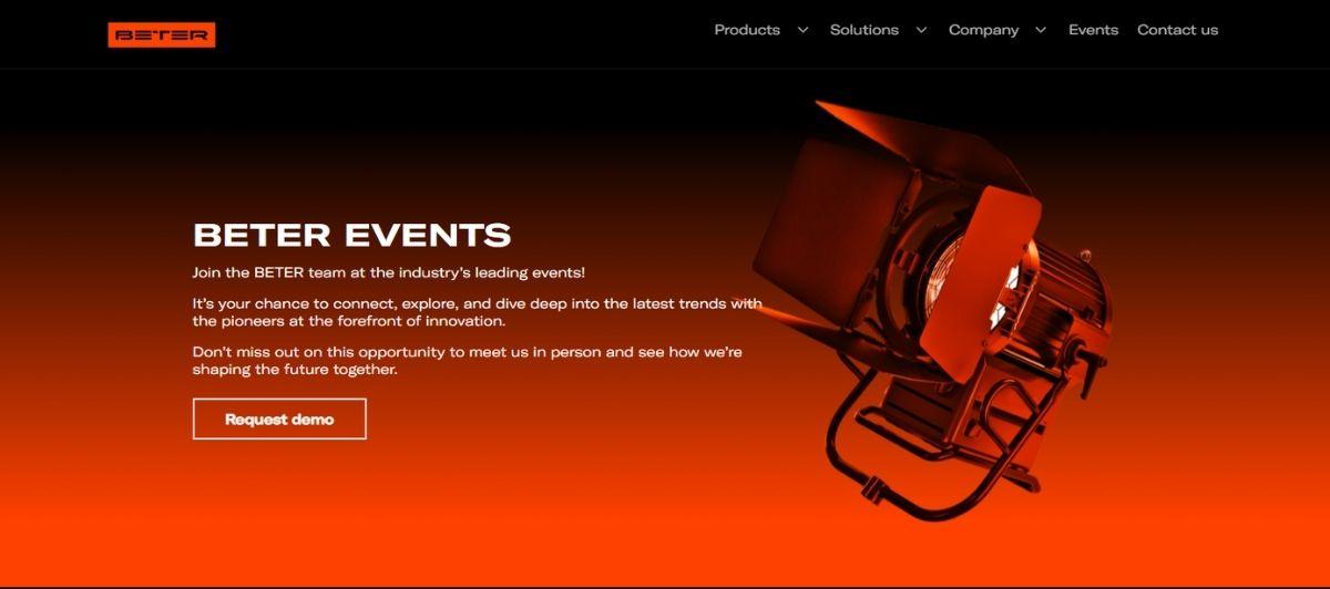 Hero banner for Better Events: orange-to-black gradient background with a large stage light on the right and white text on the left introducing BETTER EVENTS and a 'Request demo' call to action.