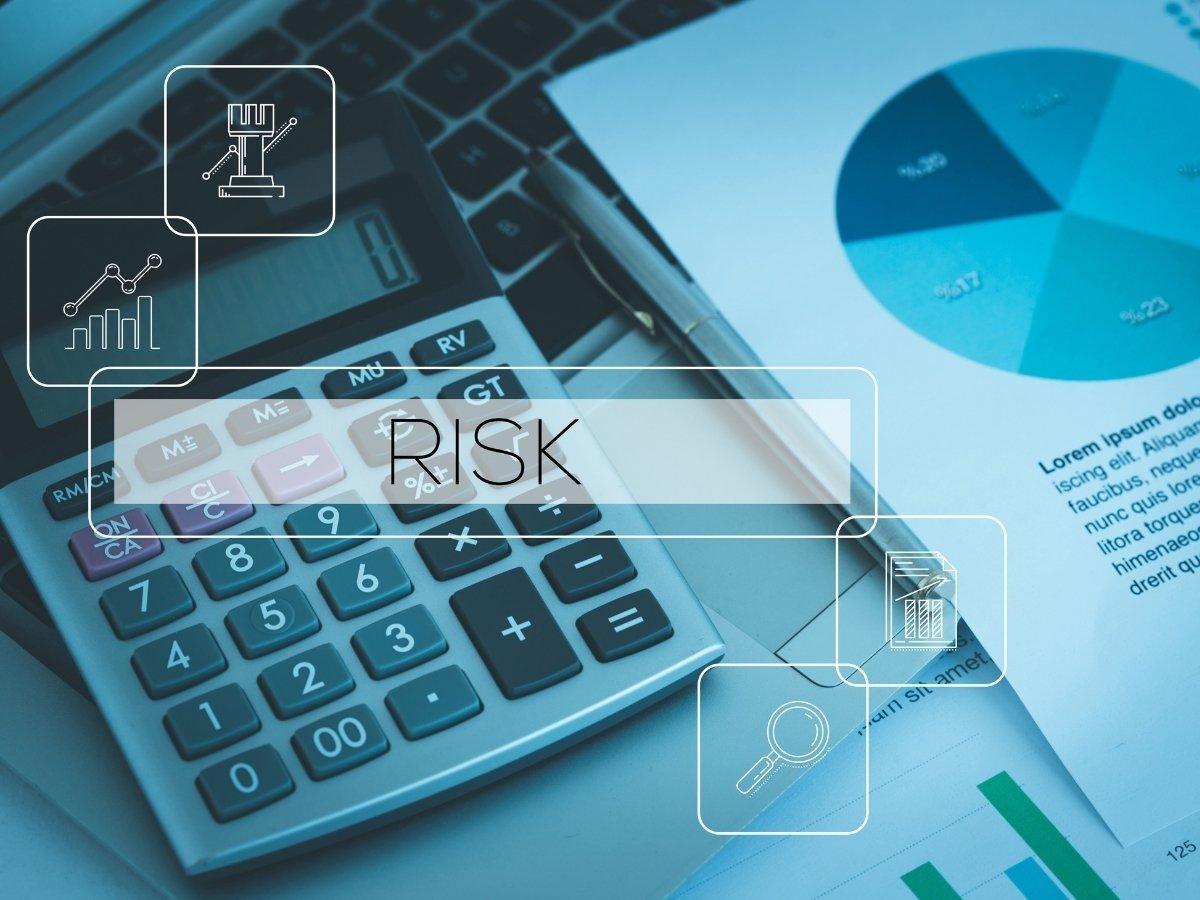 Financial risk analysis scene with a calculator, pie chart, and data icons overlayed around the word RISK.