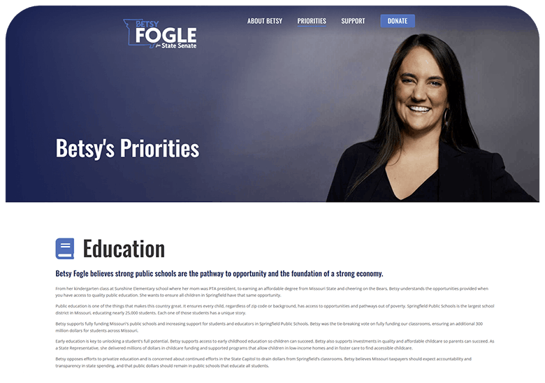 Campaign hero for Betsy Fogle with a smiling woman on the right and the title 'Betsy's Priorities' on a blue gradient background.