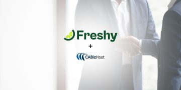 Freshy and CABizHost logos with a handshake in the blurred background, symbolizing a partnership.