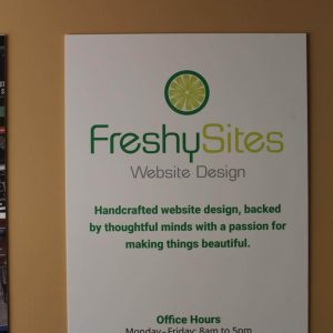 FreshySites Fairfax sign with hours
