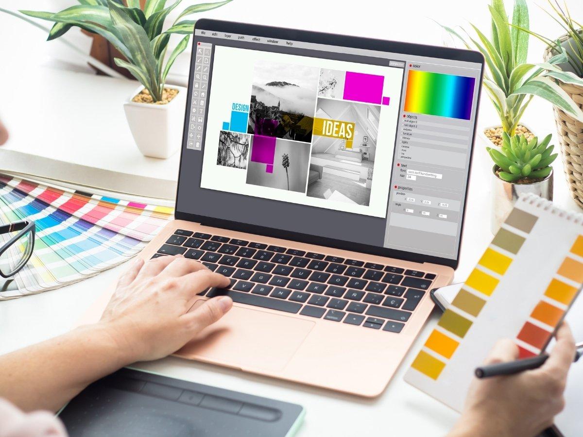 Person edits a collage design on a pink laptop with color swatches nearby.