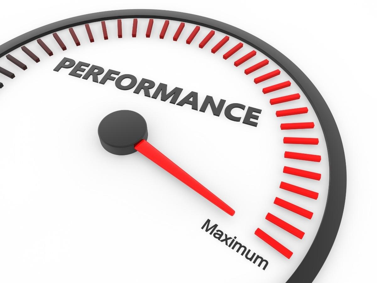 Gauge-style meter with red needle near 'Maximum' for high performance. (informative)