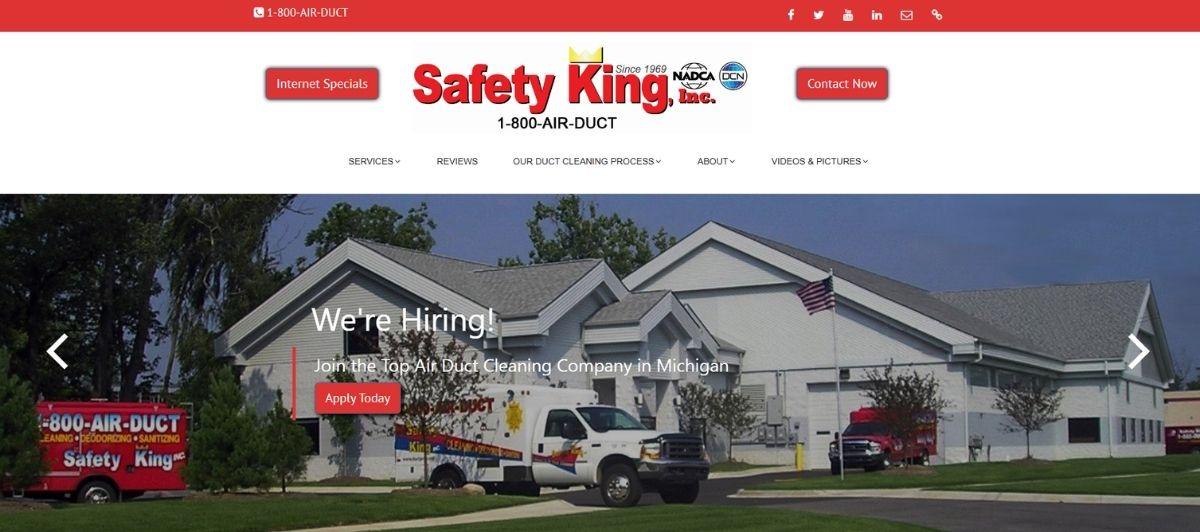 We're Hiring! Exterior of Safety King, Inc. building with a white truck and red van in front (hiring banner overlay).