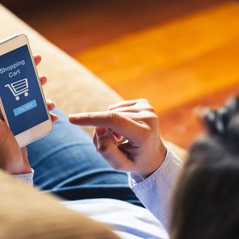 Girl using e-commerce site on mobile device