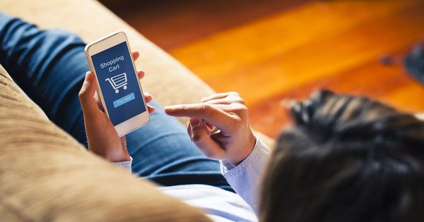 Girl using e-commerce site on mobile device